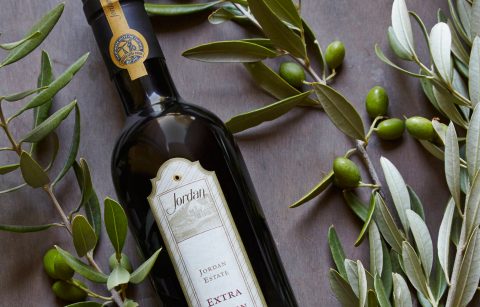 Jordan Estate Extra Virgin Olive Oil bottle with olive branches
