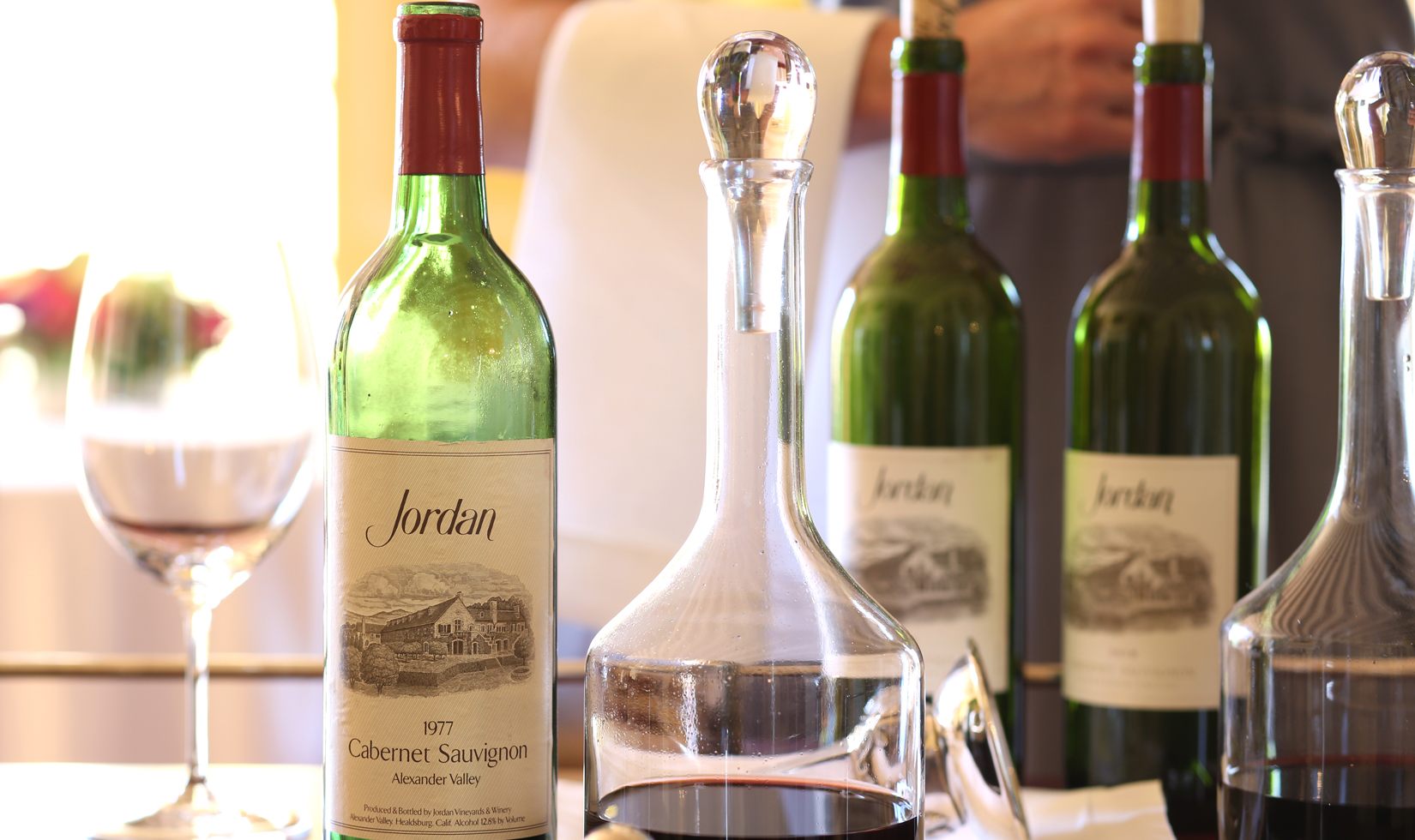 3 Jordan Cabernet Sauvignon Wines with wine glass in the table as featured in Wine Country Table
