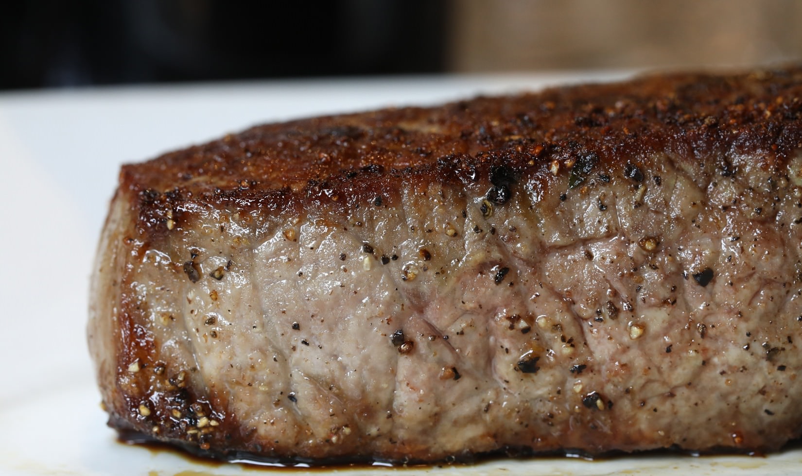 Grilled New York strip steak pairs well with Cabernet Sauvignon.