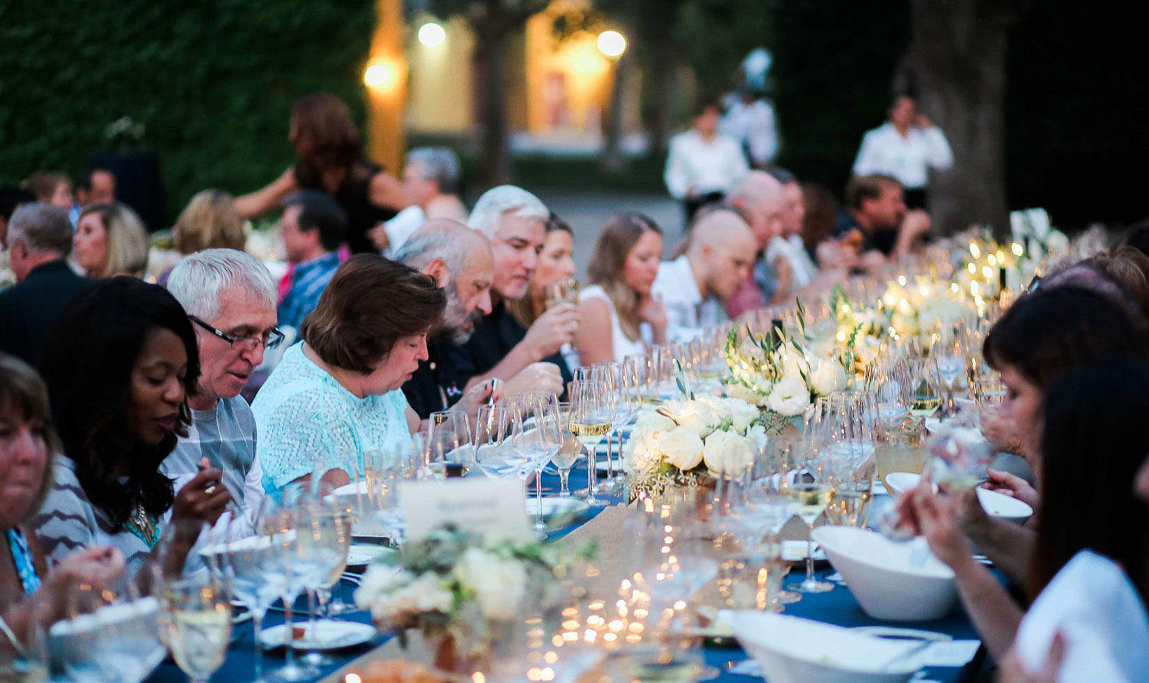Lot of Guests enjoying alfresco dining at Jordan Winery as featured in Wine Country Table