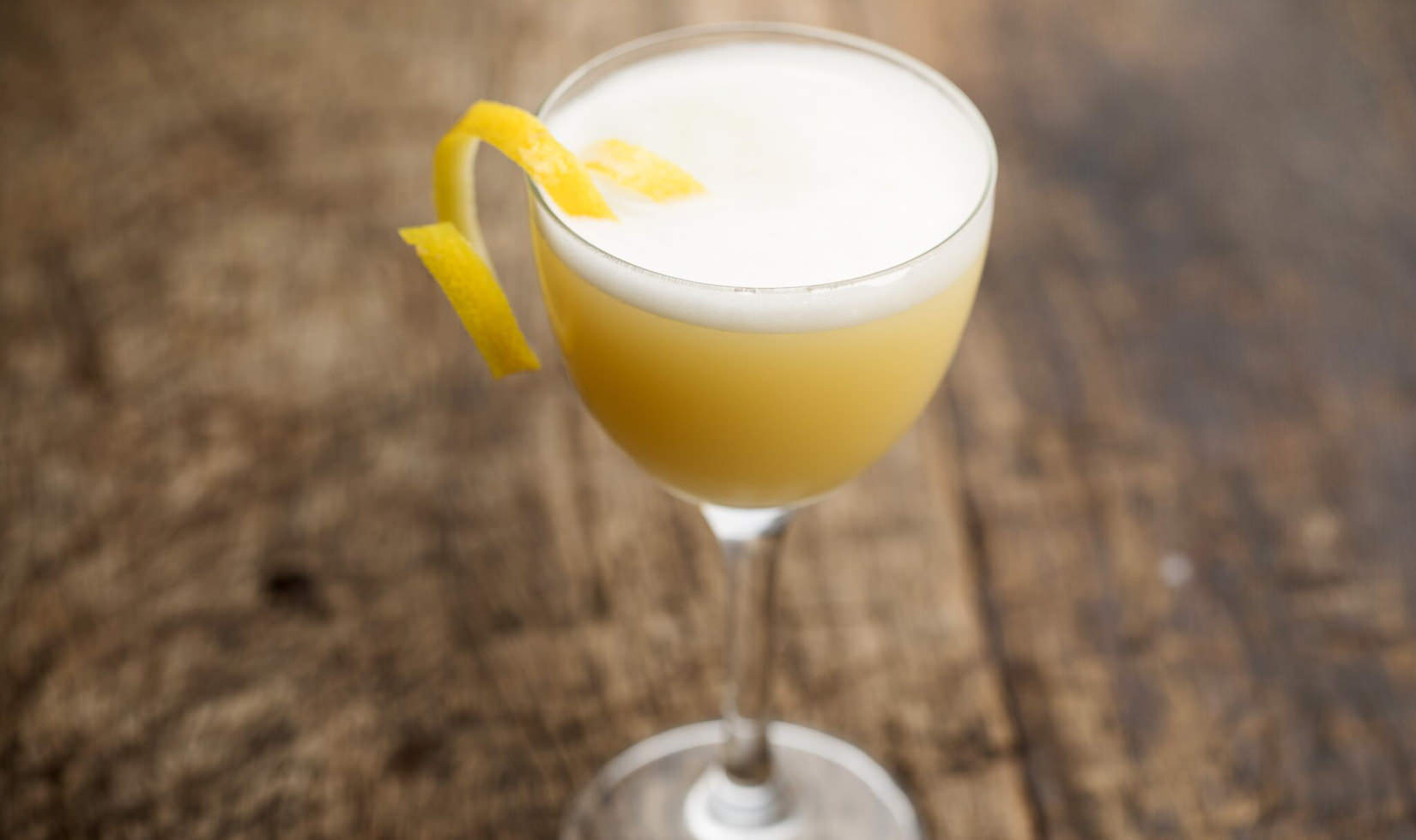 Yellow cocktail with lemon twist, Spirit Bar by Dry Creek Kitchen Healdsburg