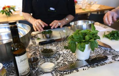 Jordan Winery olive oil and basil on a kitchen counter at a cooking class at Relish