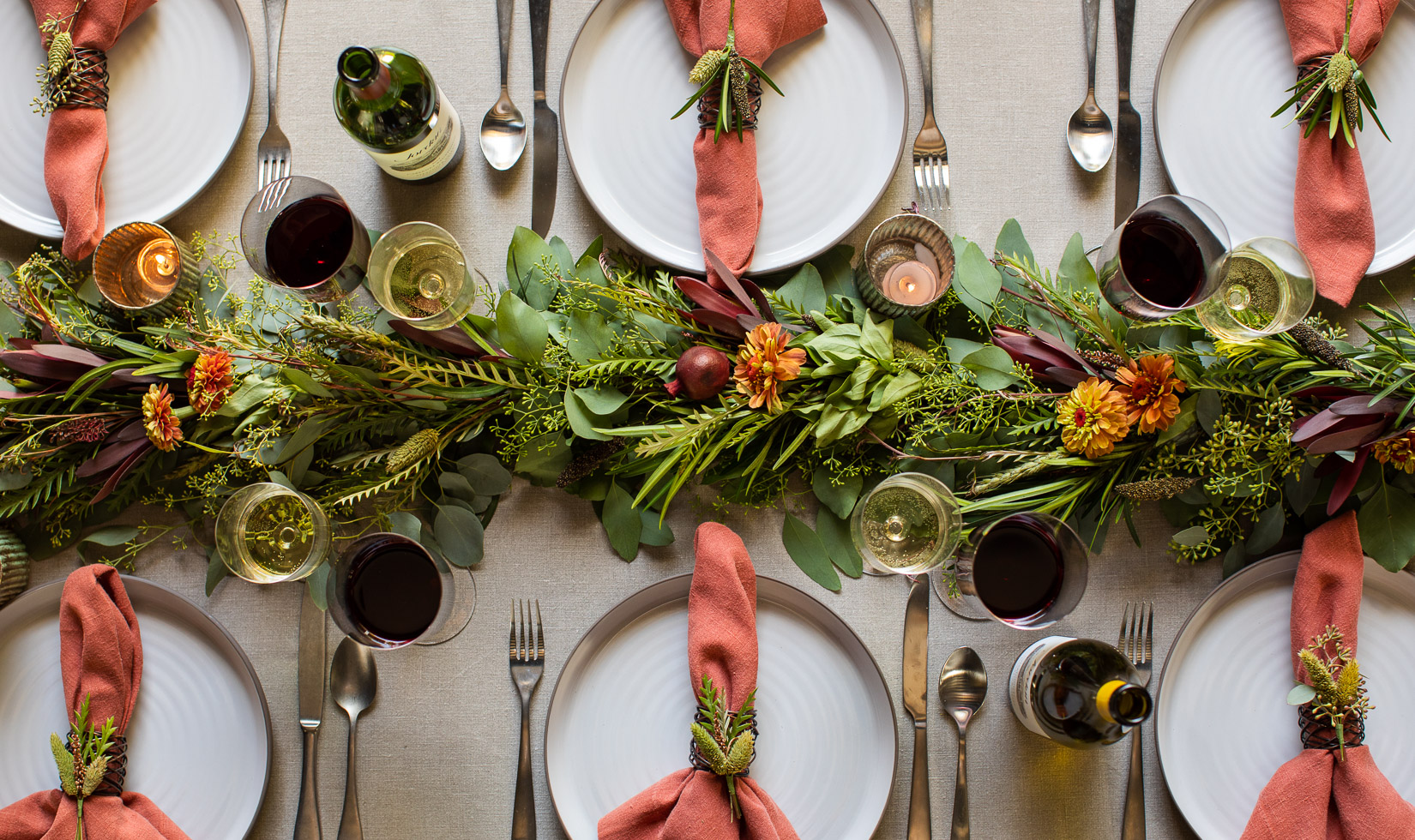 Thanksgiving Holiday Tablescape Centerpiece with red, orange and yellow flowers