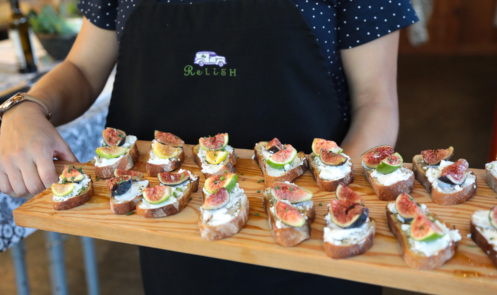 Fig and goat cheese crostinis made by guests at Jordan Winery lunch at Relish; Healdsburg cooking events