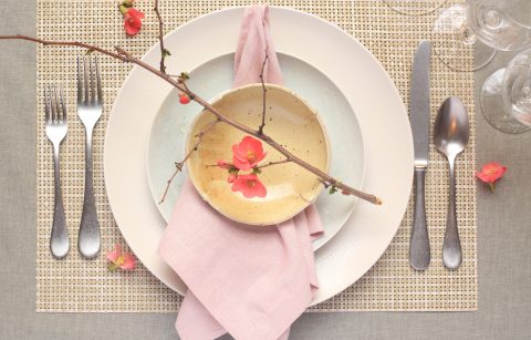 spring dinner table place setting with cherry blossoms