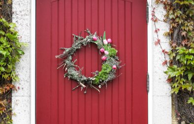 tulip and moss wreath on red door at Jordan Winery