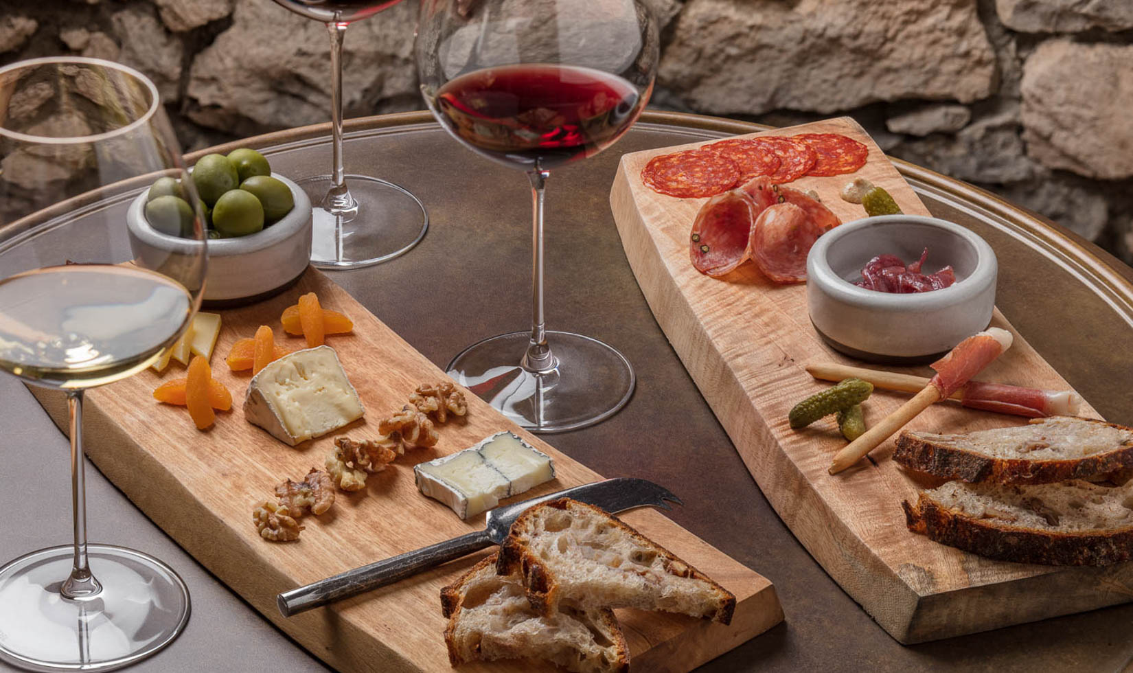 Pangloss Winery cheese boards with wine glasses