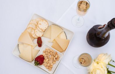 cheese plate overhead with Gloria Ferrer sparkling wine