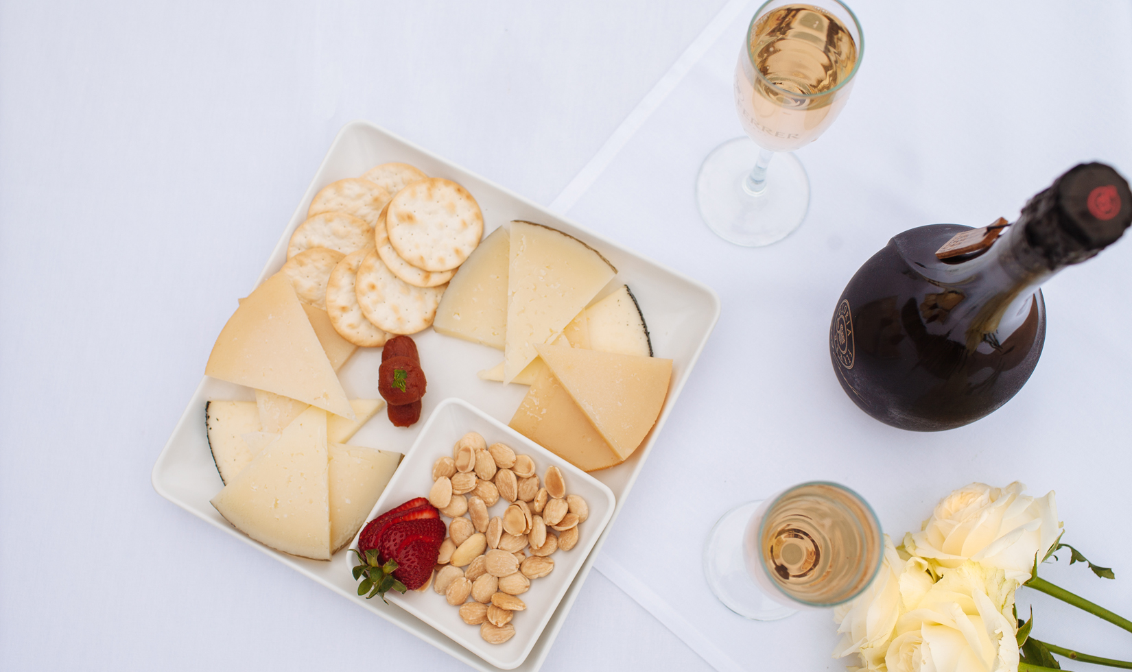 cheese plate overhead with Gloria Ferrer sparkling wine