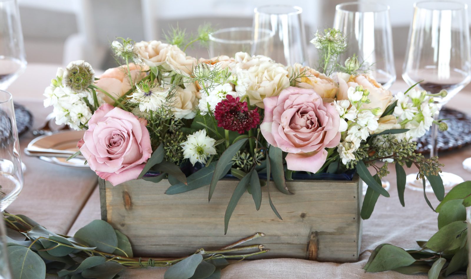Floral arrangement idea, rustic summer centerpiece with roses, scabiosa, white stock