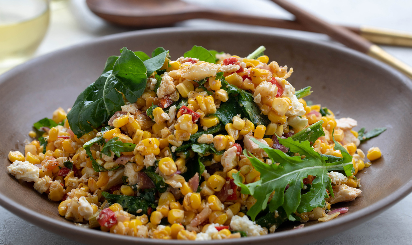 grilled corn and red pepper salad in bowl