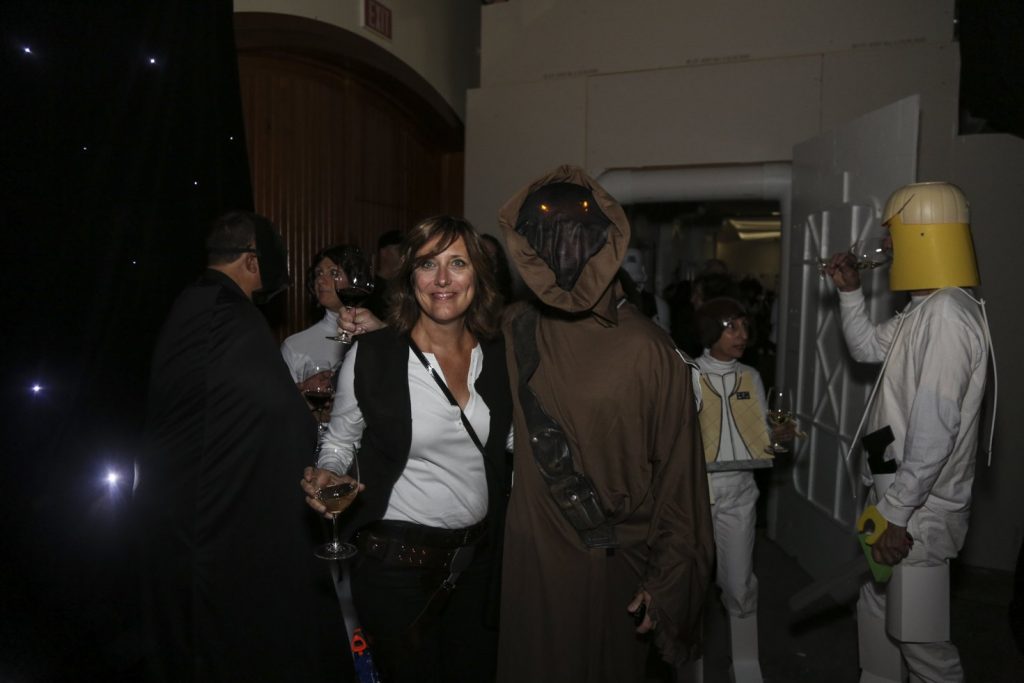 Guests dressed up for Star Wars Halloween party posing in Jordan's Oak Tank Room.