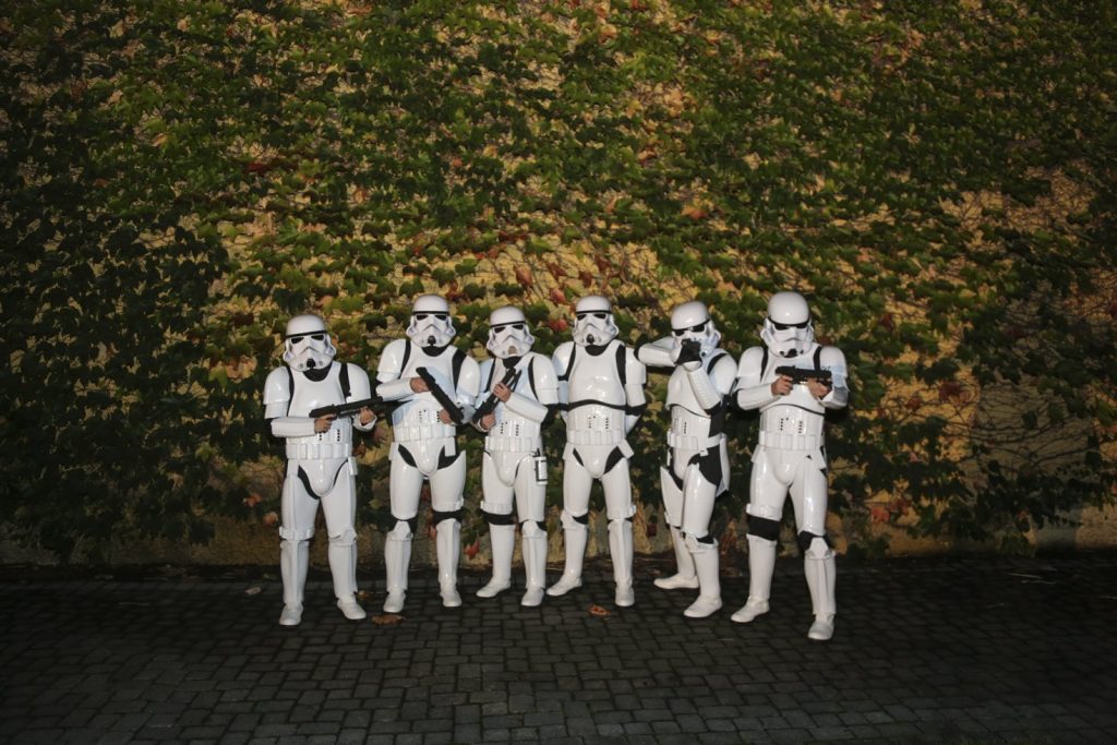 Six Stormtroopers posing for Jordan's Halloween Party.