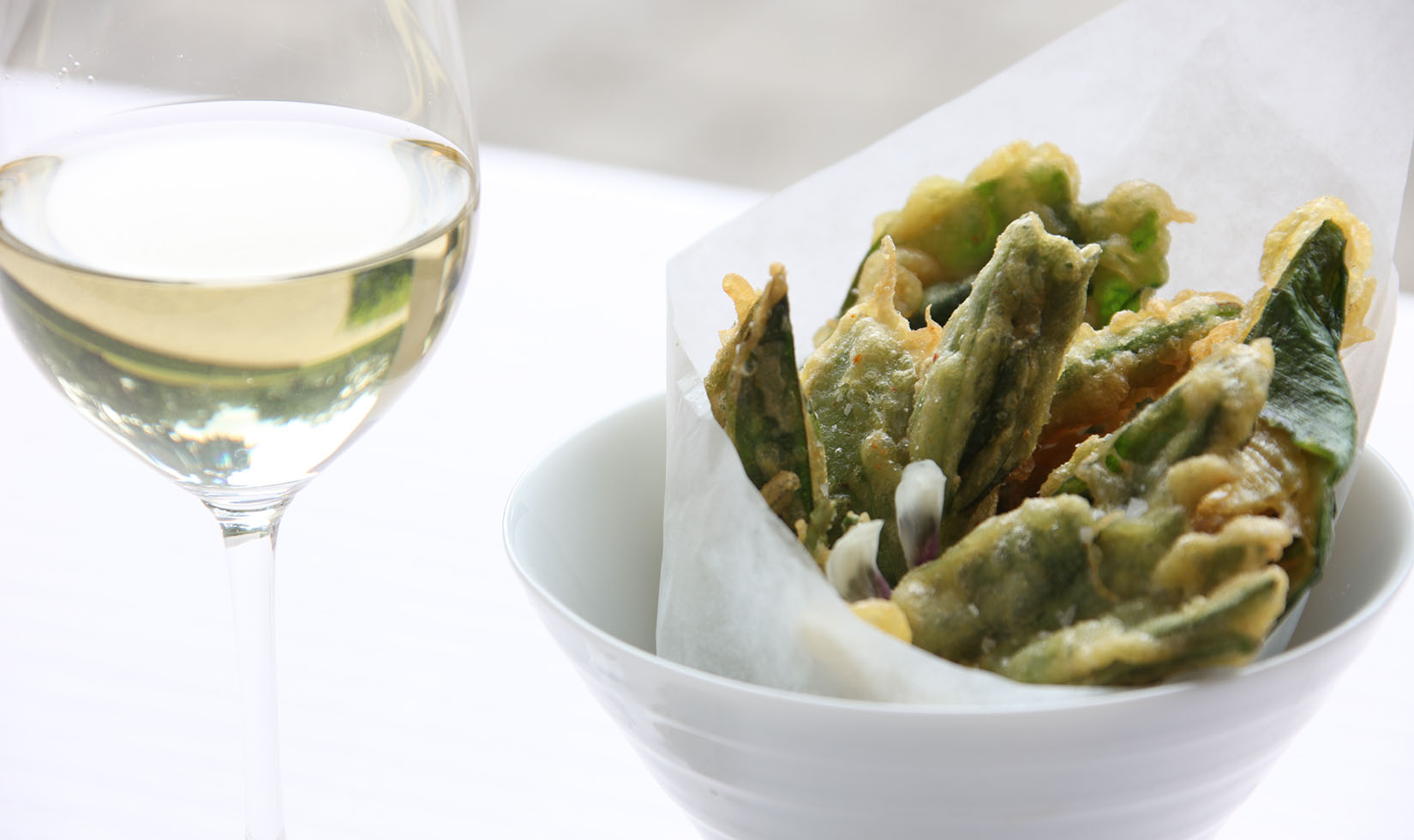 vegetable tempura in white bowl with jordan chardonnay