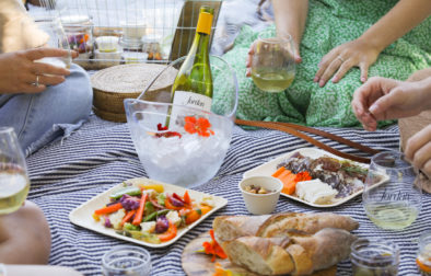 outdoor jordan winery picnic with jordan chardonnay and snacks