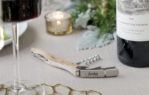 jordan winery wine barrel corkscrew on holiday table with cabernet
