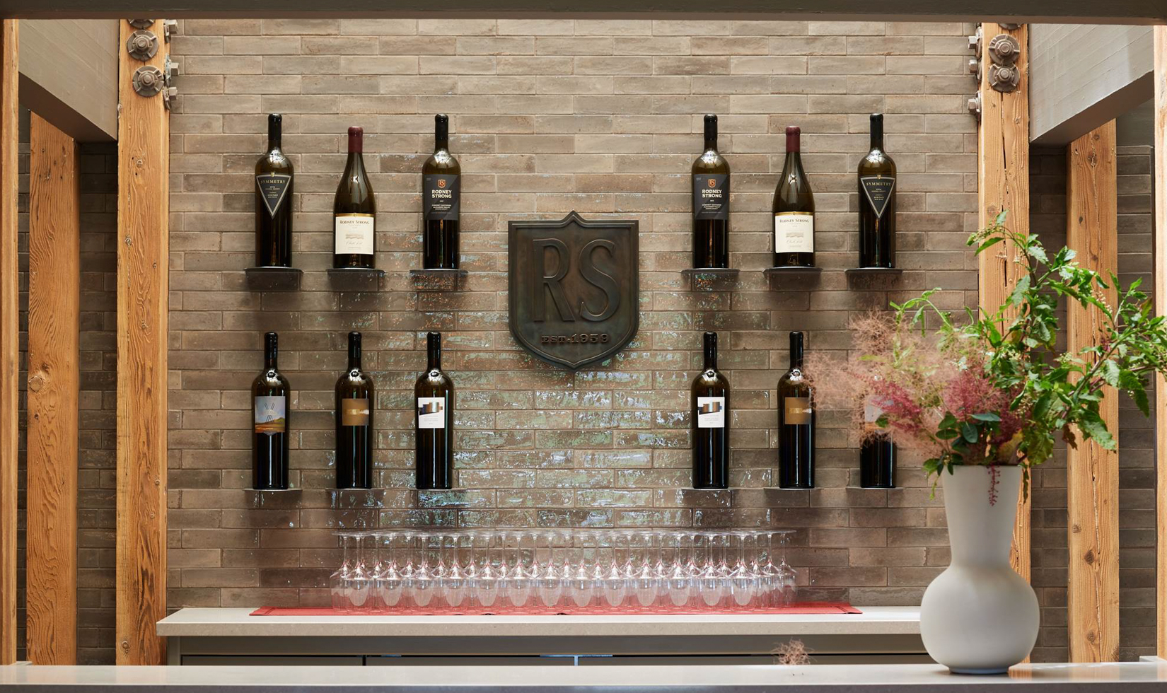 wall of big bottles of wine