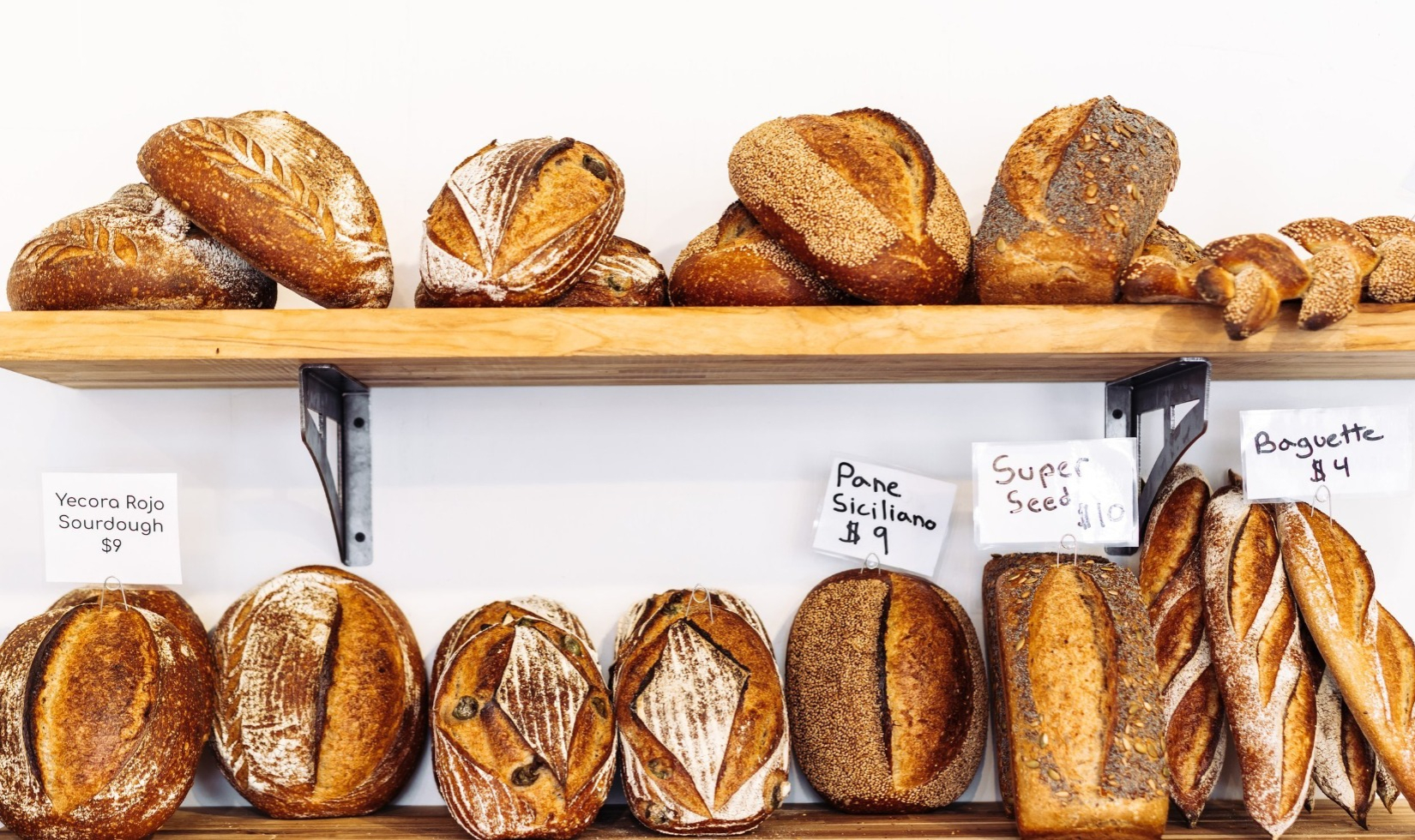 Shelves with fresh loaves of artisanal breads