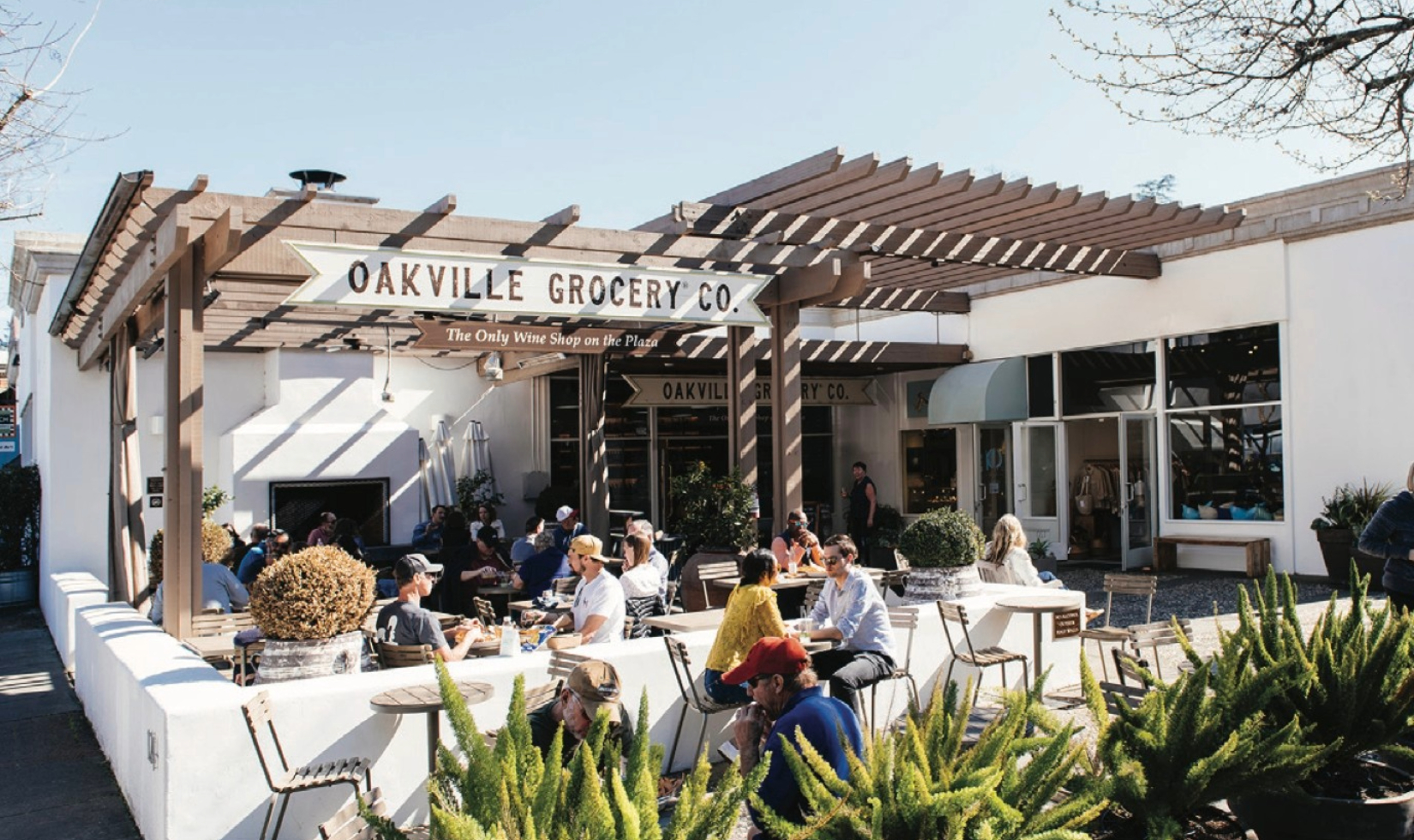 Diners at tables at the outdoor terrace at the Oakville Grocery shop and cafe in downtown Healdsburg. 