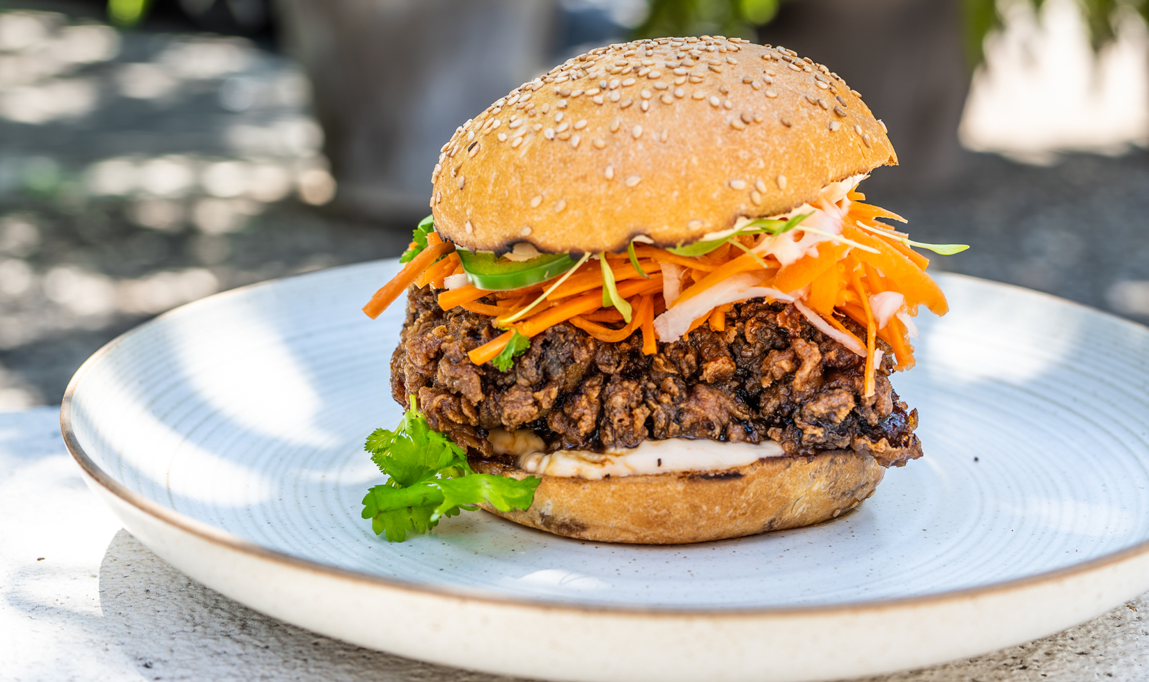 chicken sandwich on white plate