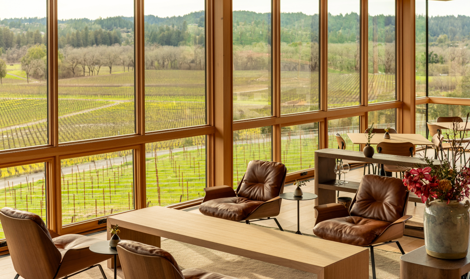 Interior of the tasting room at Auteur Wines with vineyard views from the windows